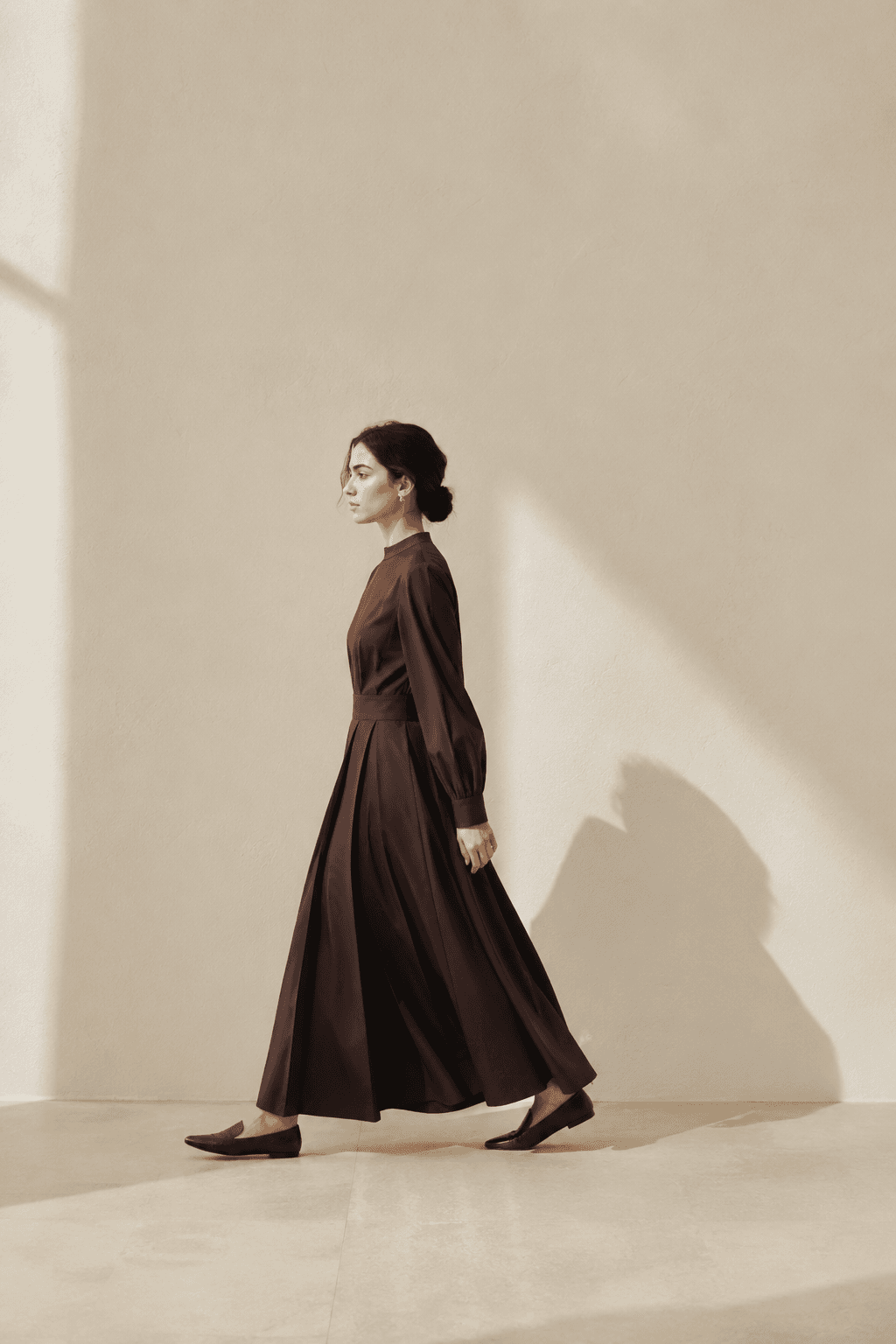 Dark chocolate long-sleeve dress in profile